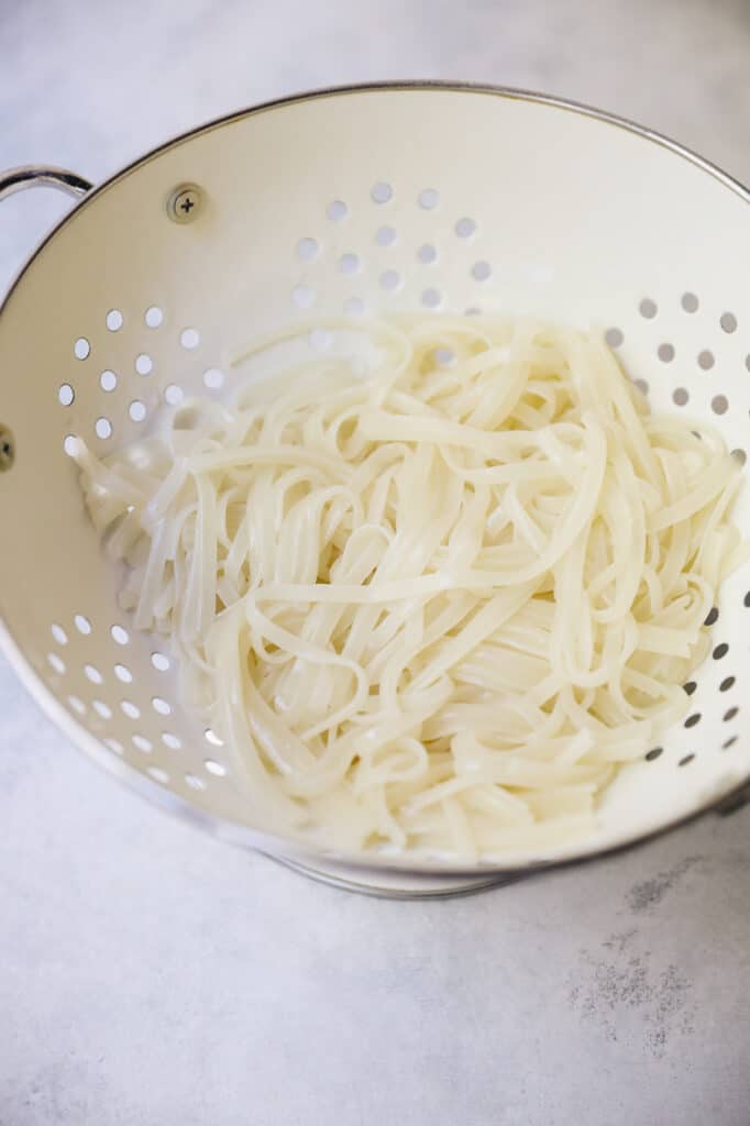 rice noodles in a colander