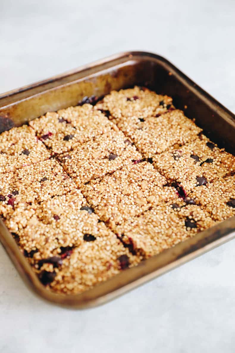 quinoa bars baked in a 9x9 inch baking dish.
