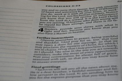 A close up of an open book on a table